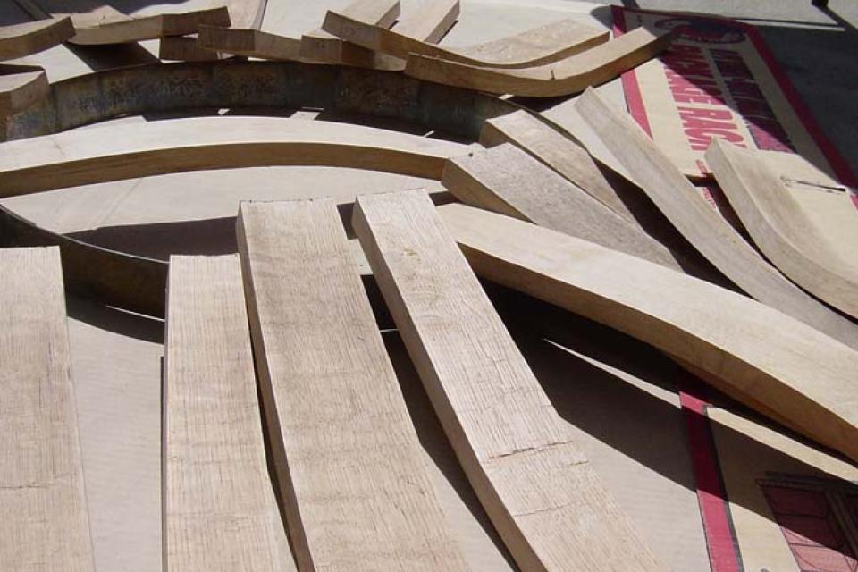 Barrel staves lay out in the sun